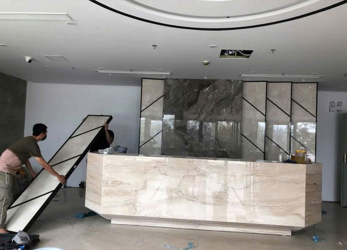 Thiết kế và thi công quầy lễ tân vách ốp trang trí khu vực sảnh